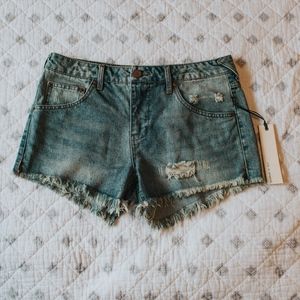 Trendy, distressed denim shorts